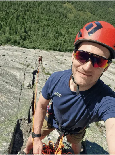 Me and my partner climbing on Hægefjell during summer